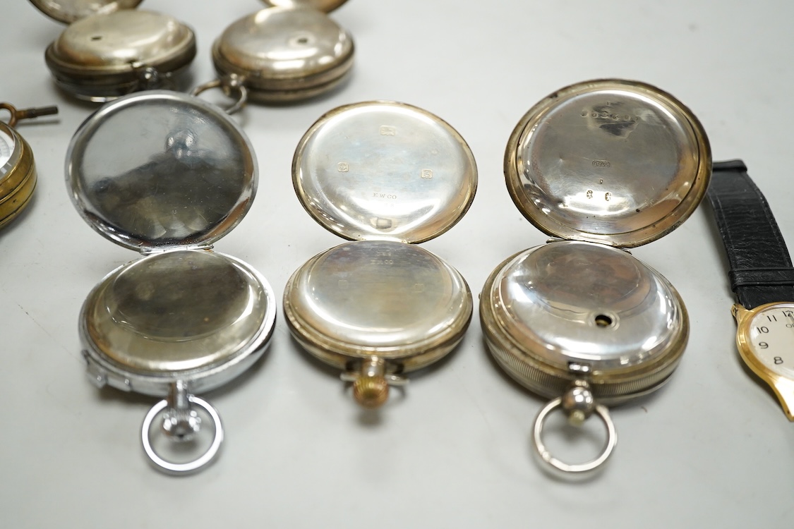 A George V silver cased goliath calendar moon phase open faced pocket watch, case diameter approx. 67mm(a.f.), together with five other pocket watches, including silver and white metal Waltham, a Camerer Cuss chrome case